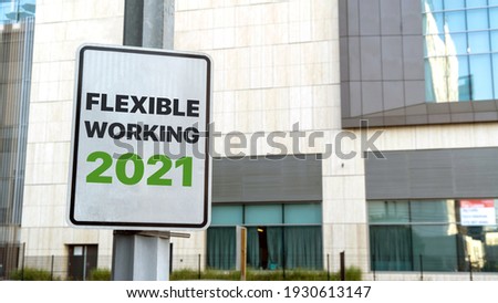 Flexible working 2021 sign in downtown city setting