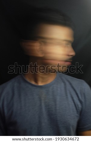 slow shutter photography moving head portraits male black background 