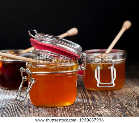 dipped in honey specially made from wood homemade coarse spoon, sweet bee honey and wooden spoon that allows you to transfer and pour honey without dripping and spreading