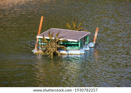 Photovoltaic Solar energy powered Small water mill which its aim of using is to increase the dissolved oxygen in water when the blade spinning in order to prevent the water to become waste water