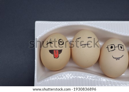 Egg on face emoji with black background