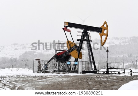 winter landscape. Oil pumps. Oil industry equipment. Frosty Morning