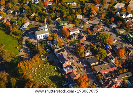 Aerial fall foliage view of rural village, Stowe, Vermont, USA Royalty-Free Stock Photo #193089095