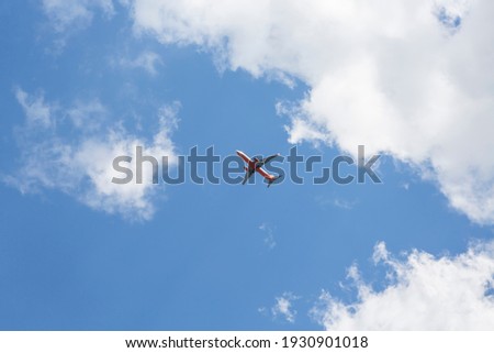 Small airplane flying in the clouds over the blue sky High resolution photo editing Image Source Bookcover Design
