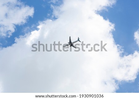 Small airplane flying in the clouds over the blue sky High resolution photo editing Image Source Bookcover Design