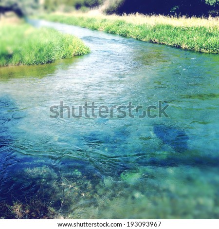 Pure clean spring water stream Royalty-Free Stock Photo #193093967