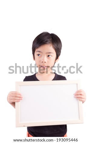 child with whiteboard