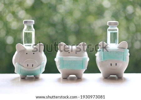 Piggy bank showing how to wearing protective medical mask correct for protect smog or PM 2.5 and viruses with medicine bottle on natural green background, Medical insurance and Health care concept