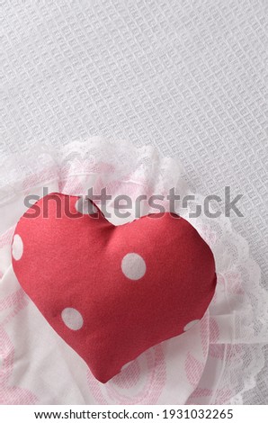 red polka dot fabric heart