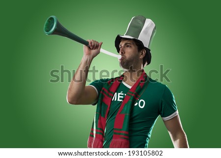Mexican Fan Celebrating, on a green background.