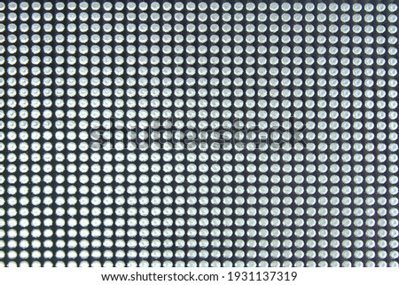 Abstract background with rhinestones. Factory fabric with rhinestones. Royalty-Free Stock Photo #1931137319