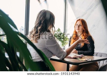Mental health, wellness, support, emotional stress, therapy concept. Communication session of woman psychologist and client. Psychotherapy or talk therapy. Royalty-Free Stock Photo #1931143940