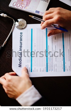 man filling health insurance application. Stethoscope and health medical form. claim form. Male doctor. 