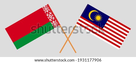 Crossed flags of Belarus and Malaysia. Official colors. Correct proportion