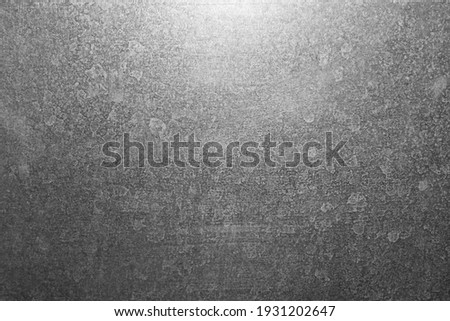 Grey metal background with traces of water and stains. Vignette