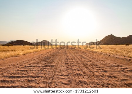 close up of a washboard gravel road in Namibia Royalty-Free Stock Photo #1931212601
