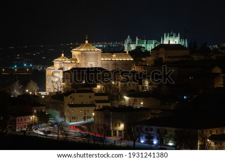 San Gil convent building, headquarter of he Castile La Mancha parliament, and traffic light trails among old streets by night. Toledo, Spain.