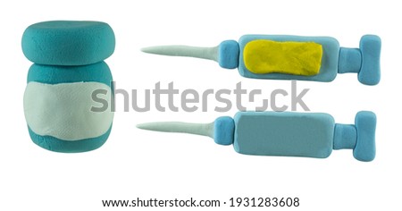 syringe and vuccine bottle made from plasticine on white