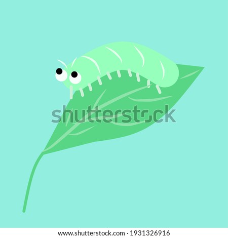 A cute caterpillar on the green leaf background