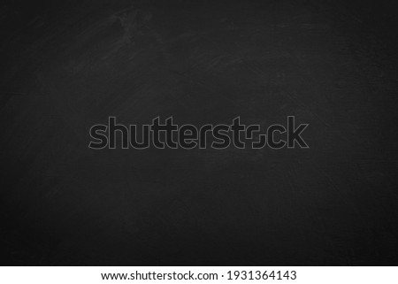 Black color on wooden board background , copy space for textures message.