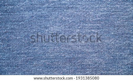 Blue denim jeans texture background.
top view.  