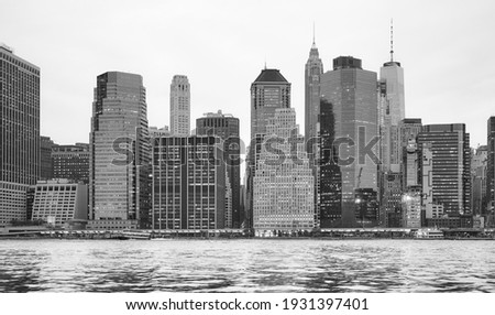 Black and white picture of New York City waterfront, USA.