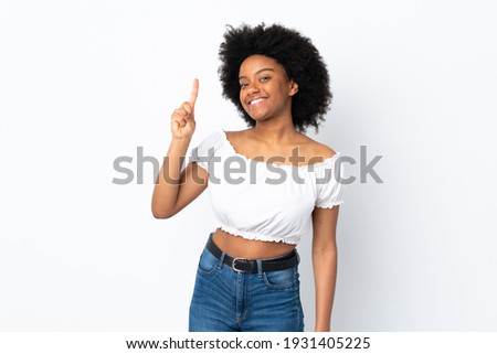 Young African American woman isolated on white background showing and lifting a finger in sign of the best