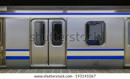 A train in a subway station Royalty-Free Stock Photo #193141067