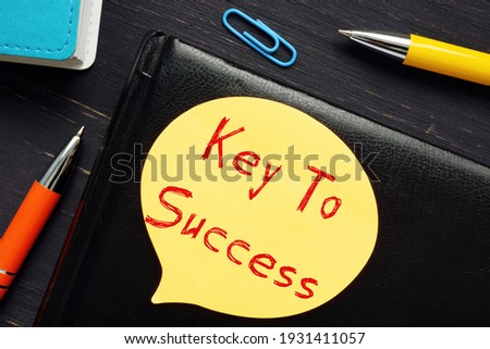 Financial concept meaning Key To Success with sign on the page. 
