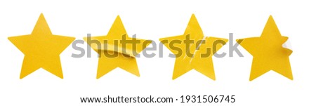 Yellow star shape paper sticker label set isolated on white background Royalty-Free Stock Photo #1931506745
