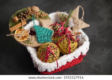 New Year and Christmas decorations, Christmas toys on a black textural background
