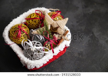 New Year and Christmas decorations, Christmas toys on a black textural background
