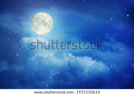 Super moon.Full moon in night sky with the clouds ,Elements of this image furnished by NASA. Royalty-Free Stock Photo #1931550614