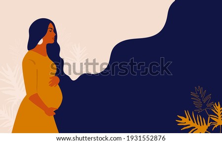 Pregnant woman on a background of leaves.The concept of pregnancy, motherhood, family. Happy mum. Pregnant belly side view. Pregnancy concept. Pregnant woman holds her belly. African american Pregnant Royalty-Free Stock Photo #1931552876