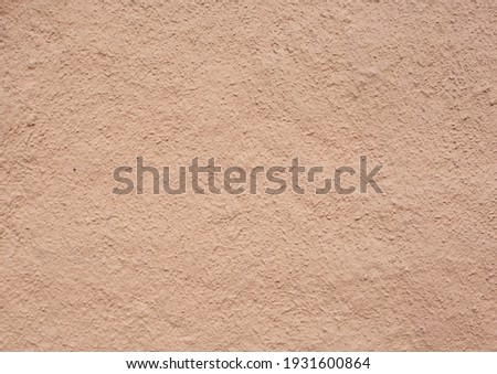 Texture of clay house structure. Wall of soil house. Mud background and vintage tone, soft picture