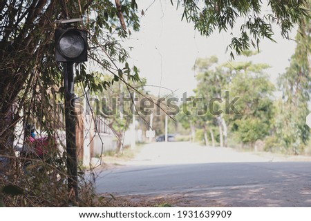 Close-up of a solar cell traffic light on a country road