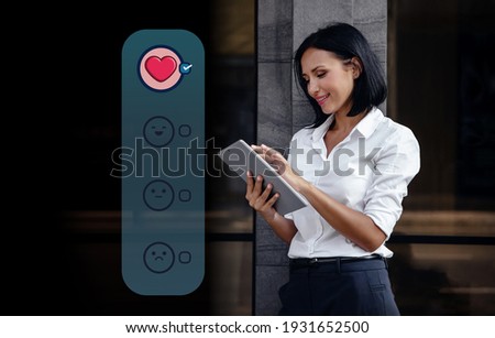 Customer Experience Concept. Happy Smiling Mixed Races Client Woman Feedback Excellent Positive Review via Tablet. Client Satisfaction Online Surveys Royalty-Free Stock Photo #1931652500