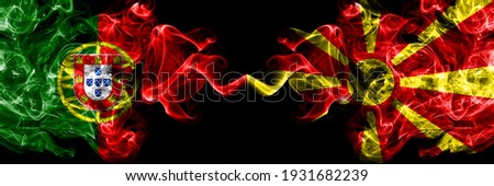 Portugal, Portuguese vs Macedonia, Macedonian smoky mystic flags placed side by side. Thick colored silky abstract smoke flags.