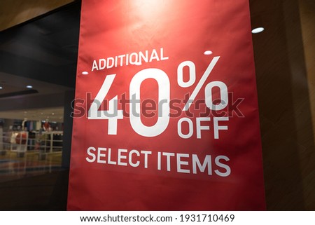 Discount sale 40% off on selected items, promotion canvas banner at the brand name outlet store. Sign for business and shopping store. 