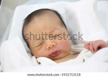 Close up of newborn baby face