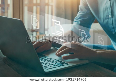 document management concept with icons on virtual screen, ERP Royalty-Free Stock Photo #1931714906