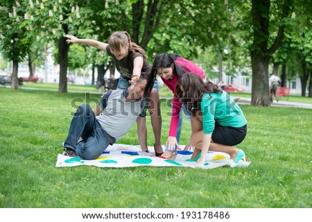 Students play a game in the park twister Royalty-Free Stock Photo #193178486