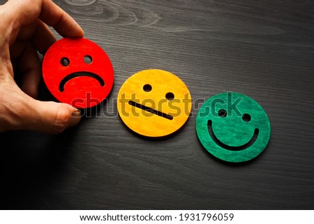 Negative feedback and rate with bad smile face. Royalty-Free Stock Photo #1931796059