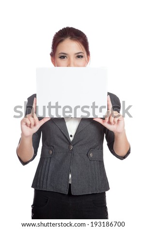 Asian businesswoman hold a blank sign close her lower face isolated on white background
