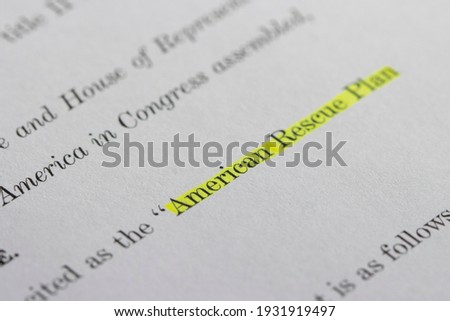 Closeup of the documents of the American Rescue Plan Act of 2021, an economic stimulus package proposed to speed up the recovery from the economic and health effects of the pandemic and the recession. Royalty-Free Stock Photo #1931919497