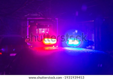 Abstract blurred background with flasher in the dark. Special signals of emergency services. Accident concept. Copyspace for text or inscription