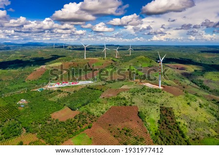 Wind generator - wind farm at Ea hleo, Dak Lak, Vietnam. Modern equipment for generating electric energy. The concept of environmental friendliness, environmental protection and tourism photo