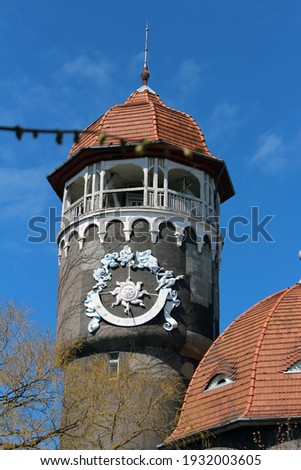 Photo of the background with an old building with a tower in the city of Kaliningrad.
