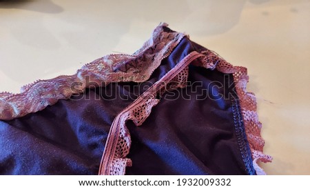 Macro shot of the purple lace-smooth luxury women panty.