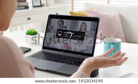 Back rear view young asian woman employee work from home using computer notebook videocall meeting conference angry annoy with low poor unreliable internet wifi connection problem issue outage. Royalty-Free Stock Photo #1932034190